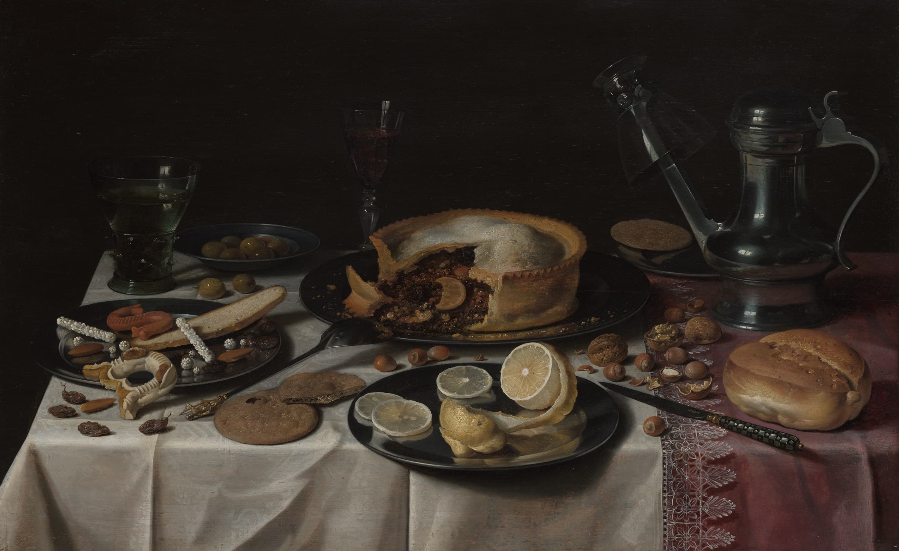 Still Life with Roemer and Flagon — A Dutch table of the golden age — green roemer, tall glass of red, a pewter flagon.