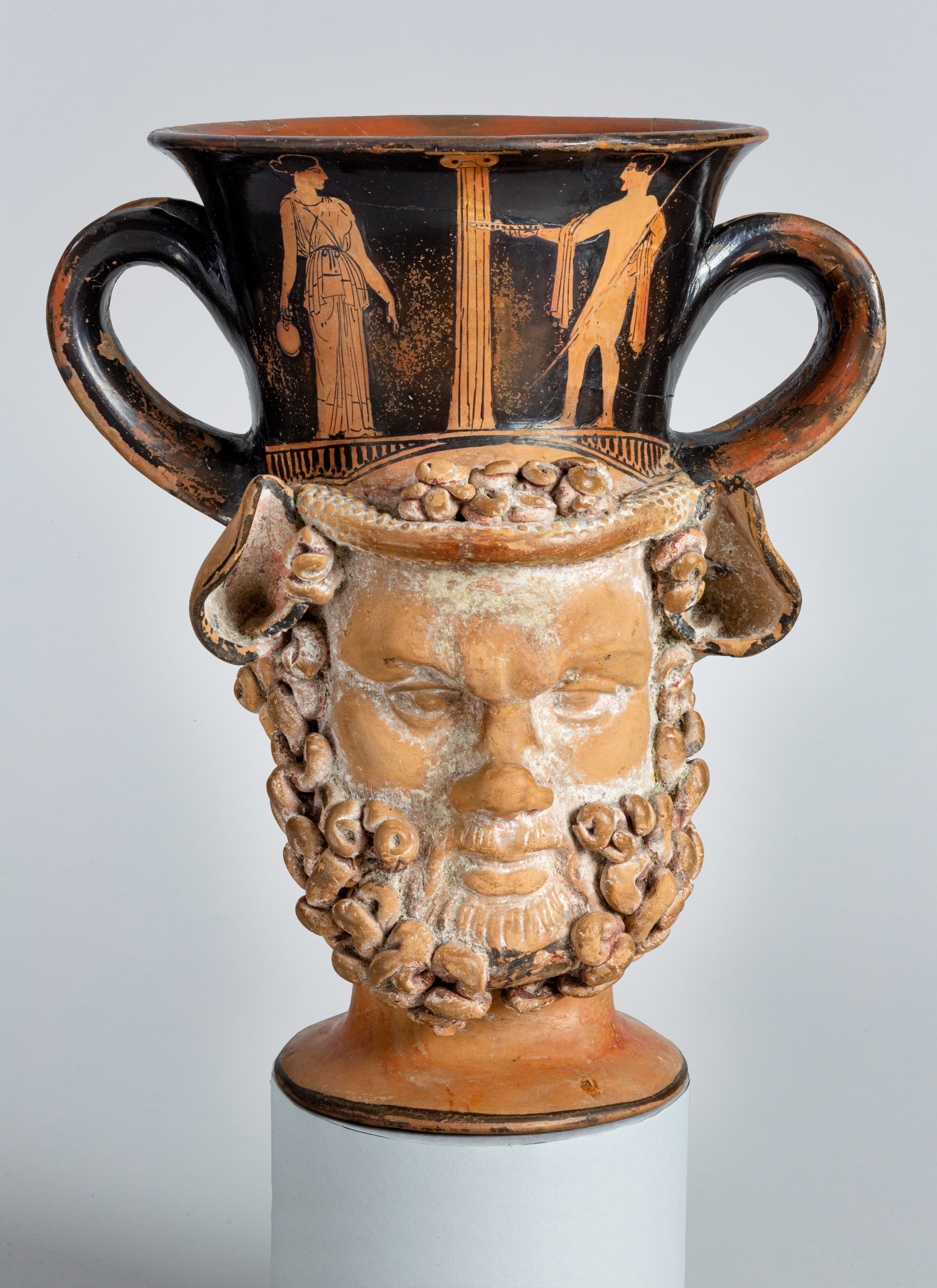 The Kantharos — the God’s Own Cup — The two-handled cup Dionysos always holds — modelled here as a satyr and a woman, back to back.